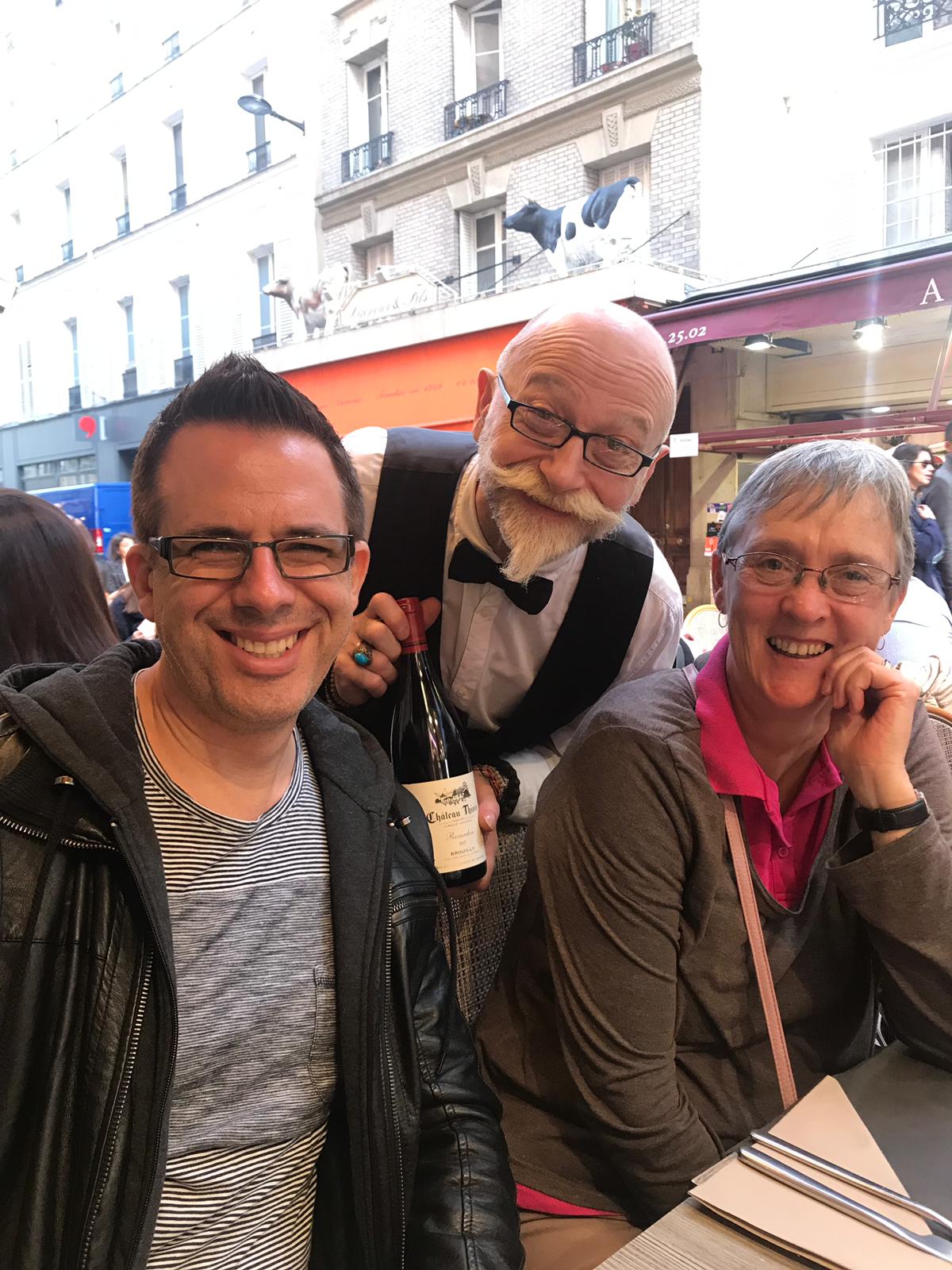 Mark and me with the wonderful waiter.